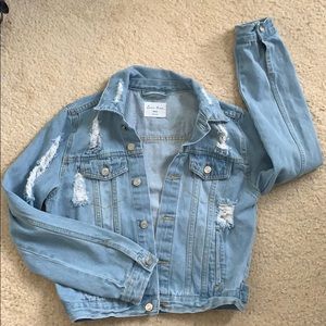 Light wash distressed jean jacket